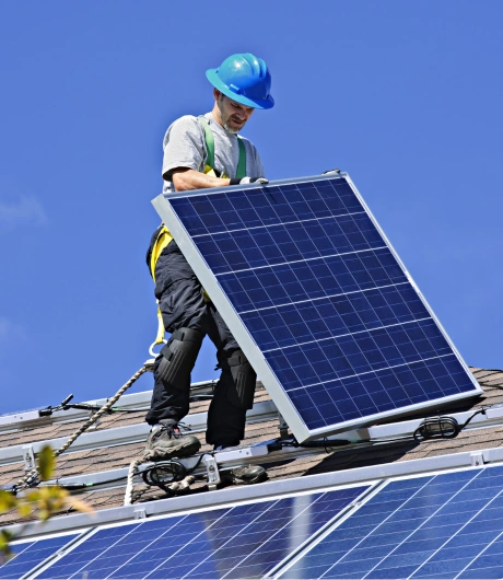 blu solar team member installing solar panel on roof in Denver, CO